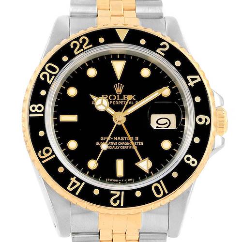 This image shows the face and part of the bracelet of the Rolex GMT-Master 16713 Men's Stainless Steel Black Dial 16713 Men's Stainless Steel Black Dial II watch, featuring a black dial and two-tone design.