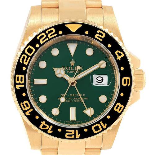 This image shows a frontal view of the Rolex GMT-Master 116718 Men's Yellow Gold Green Dial 116718 Men's Yellow Gold Green Dial watch, highlighting the green dial, date window, and time zone bezel.
