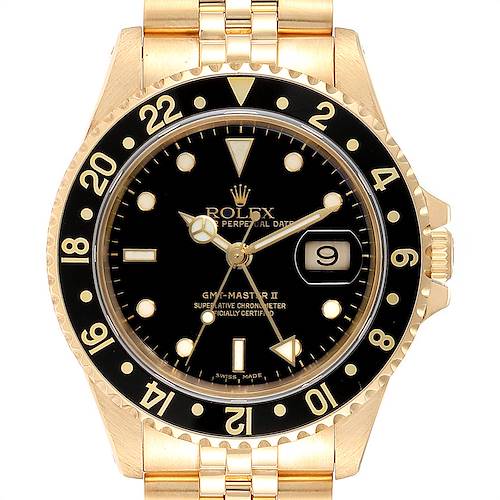 This image shows a frontal view of the dial, bezel, and bracelet of a Rolex GMT-Master 16718 Men's Yellow Gold Black Dial 16718 Men's Yellow Gold Black Dial II watch.