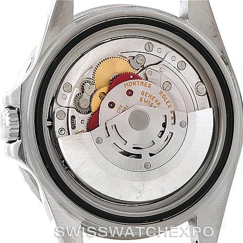 This image shows the back of a Rolex GMT-Master 16710 Men's Stainless Steel Black Dial 16710 Men's Stainless Steel Black Dial watch case, revealing its internal mechanical movement.