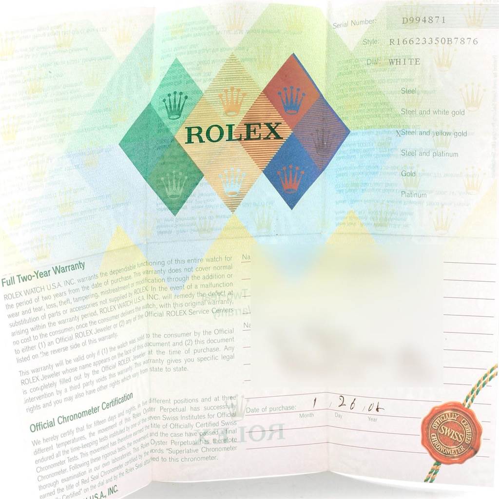 This Rolex Yacht-Master 16623 Men's Stainless Steel White Dial 16623 Men's Stainless Steel White Dial watch accessory, a warranty and certification card, is shown partially open and partially blurred.