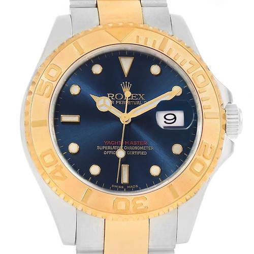 The image shows a front view of a Rolex Yacht-Master 16623 Men's Stainless Steel Blue Dial 16623 Men's Stainless Steel Blue Dial watch, highlighting its blue dial, gold bezel, and date display at 3 o'clock.