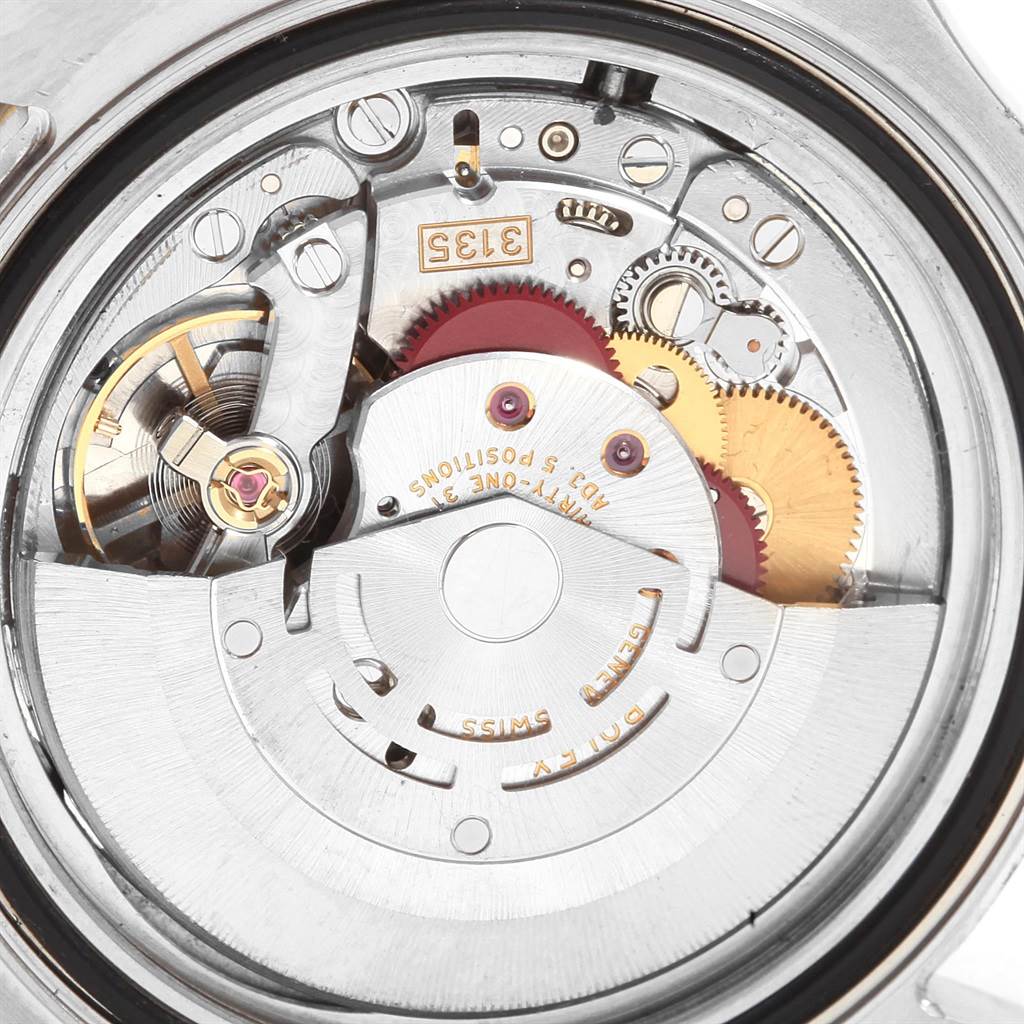 This image shows the internal mechanism of the Rolex Yacht-Master 16623 Men's Stainless Steel White Dial 16623 Men's Stainless Steel White Dial watch, highlighting gears and the rotor.