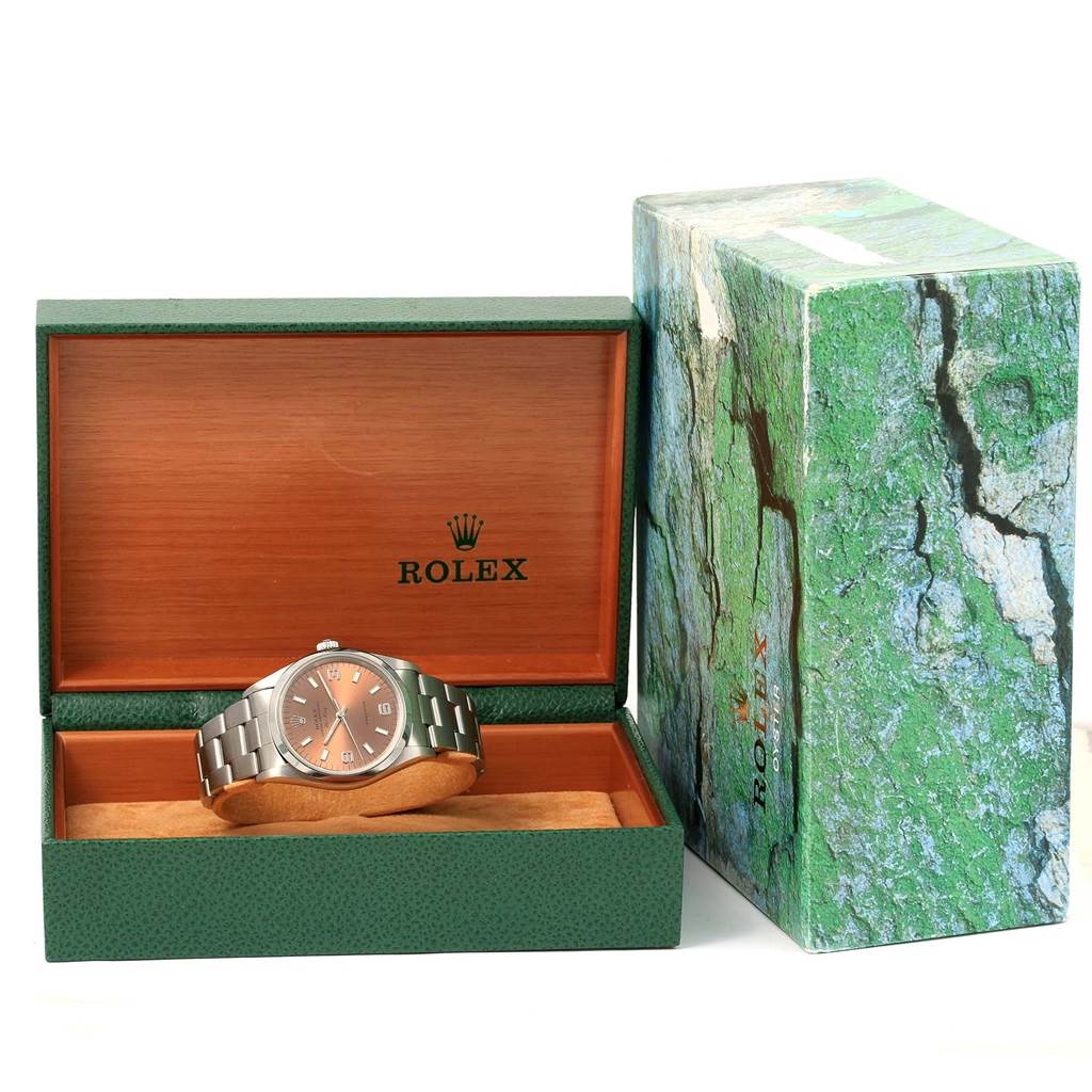 The image shows a Rolex Air-King 14000 Men's Stainless Steel Pink Dial 14000 Men's Stainless Steel Pink Dial watch inside a green and wood-tone Rolex case, with its original green packaging box beside it.