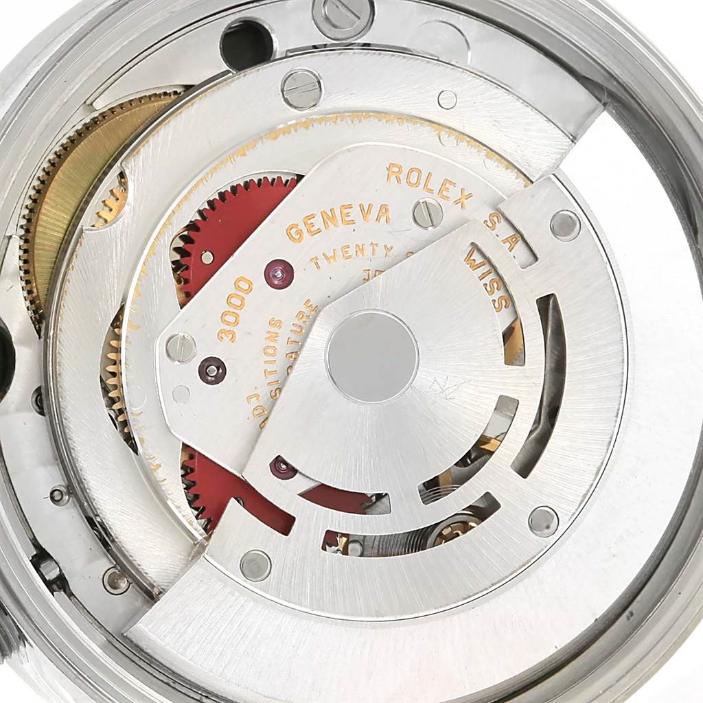 This image shows a close-up of the movement mechanism of a Rolex Air-King 14010 Men's Stainless Steel Black Dial 14010 Men's Stainless Steel Black Dial watch.