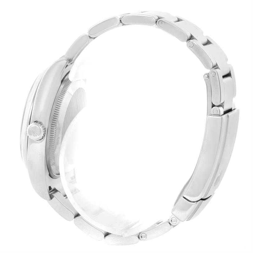 The image shows a side view of the Rolex Air-King 114200 Men's Stainless Steel Silver Dial 114200 Men's Stainless Steel Silver Dial model, detailing the crown and part of the bracelet.