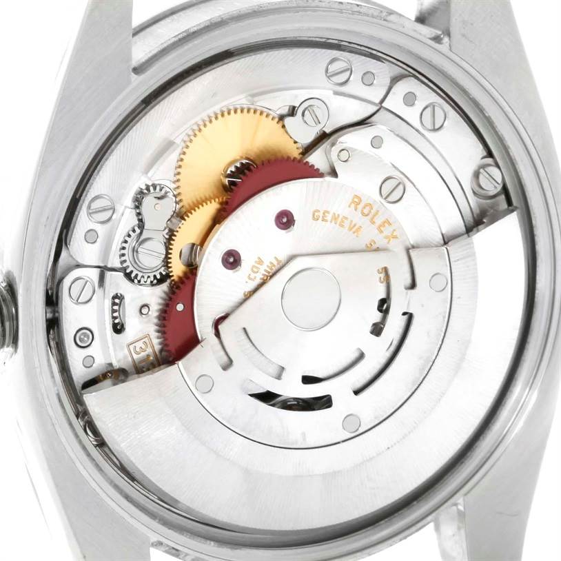This image shows the detailed view of the movement and inner mechanics of a Rolex Air-King 114200 Men's Stainless Steel Silver Dial 114200 Men's Stainless Steel Silver Dial watch from the back.