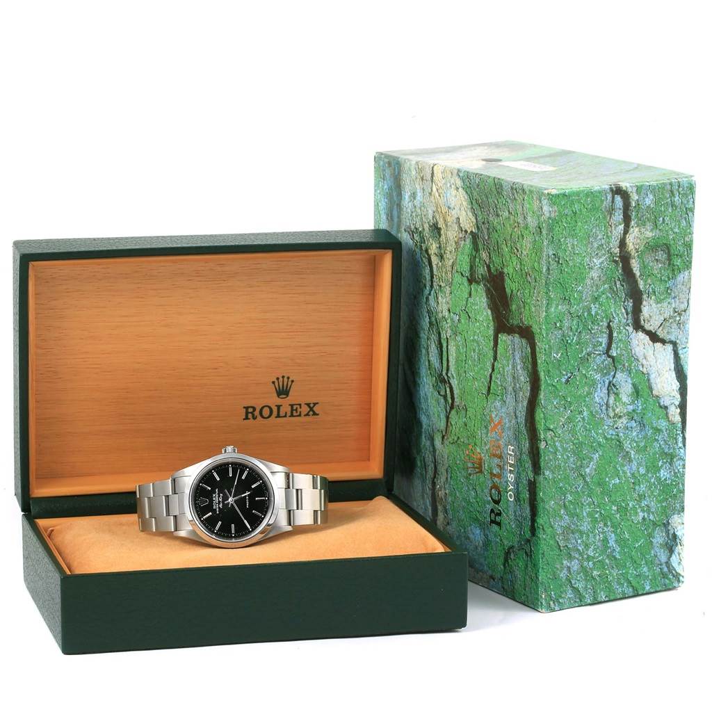 The Rolex Air-King 14000 Men's Stainless Steel Black Dial 14000 Men's Stainless Steel Black Dial watch is shown in a box with its packaging, providing a view of the watch's face and bracelet.