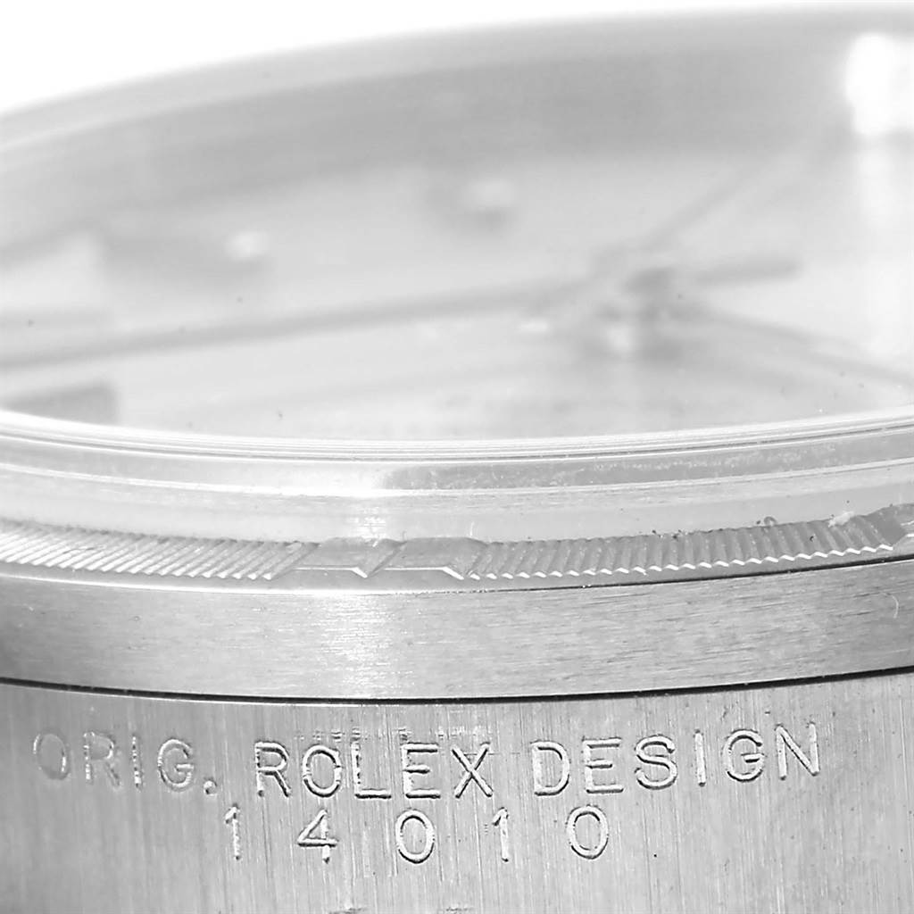 Close-up of the side view of a Rolex Air-King 14010 Men's Stainless Steel Silver Dial 14010 Men's Stainless Steel Silver Dial watch, displaying the bezel and model number "14010".