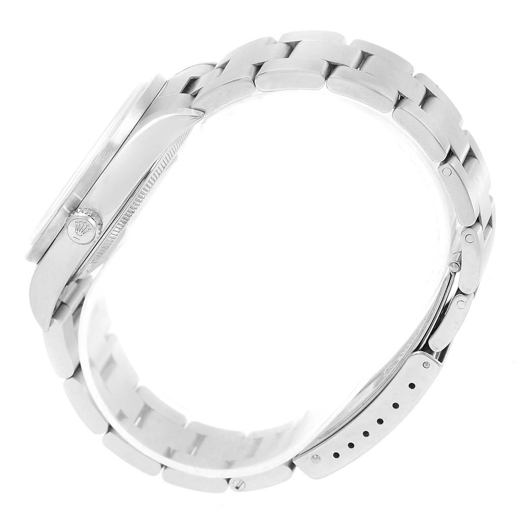 This image shows a side view of the Rolex Air-King 14010 Men's Stainless Steel Silver Dial 14010 Men's Stainless Steel Silver Dial watch, focusing on the bracelet, case, and crown.