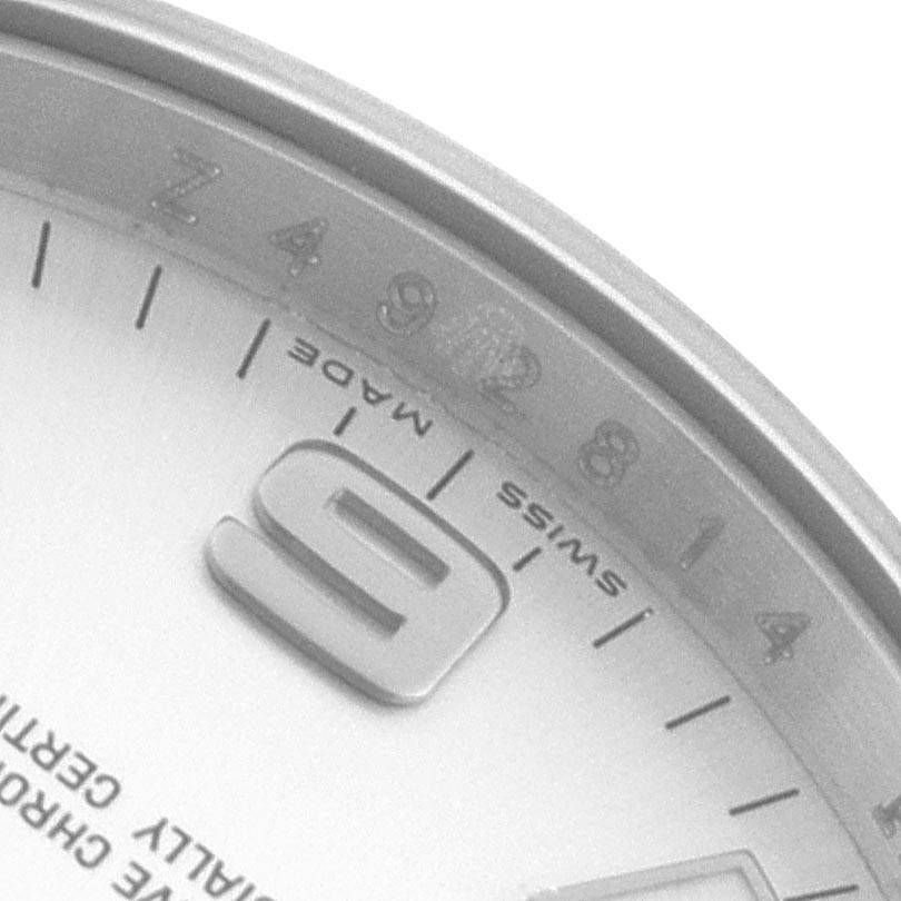 This image shows a close-up of the dial of a Rolex Air-King 114234 Men's Stainless Steel Silver Dial 114234 Men's Stainless Steel Silver Dial watch, focusing on the "9," minute markers, and partial text.