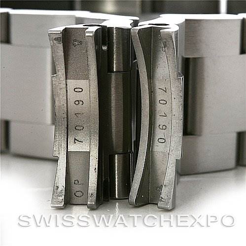 Close-up of the metal clasp and links of a Rolex Air-King 114200 Men's Stainless Steel White Dial 114200 Men's Stainless Steel White Dial watch band, showing model numbers.