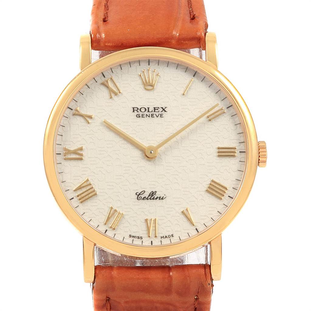 This image shows a front view of a Rolex Cellini 5112 Men's Yellow Gold Beige Dial 5112 Men's Yellow Gold Beige Dial watch, featuring its face, leather strap, and crown.