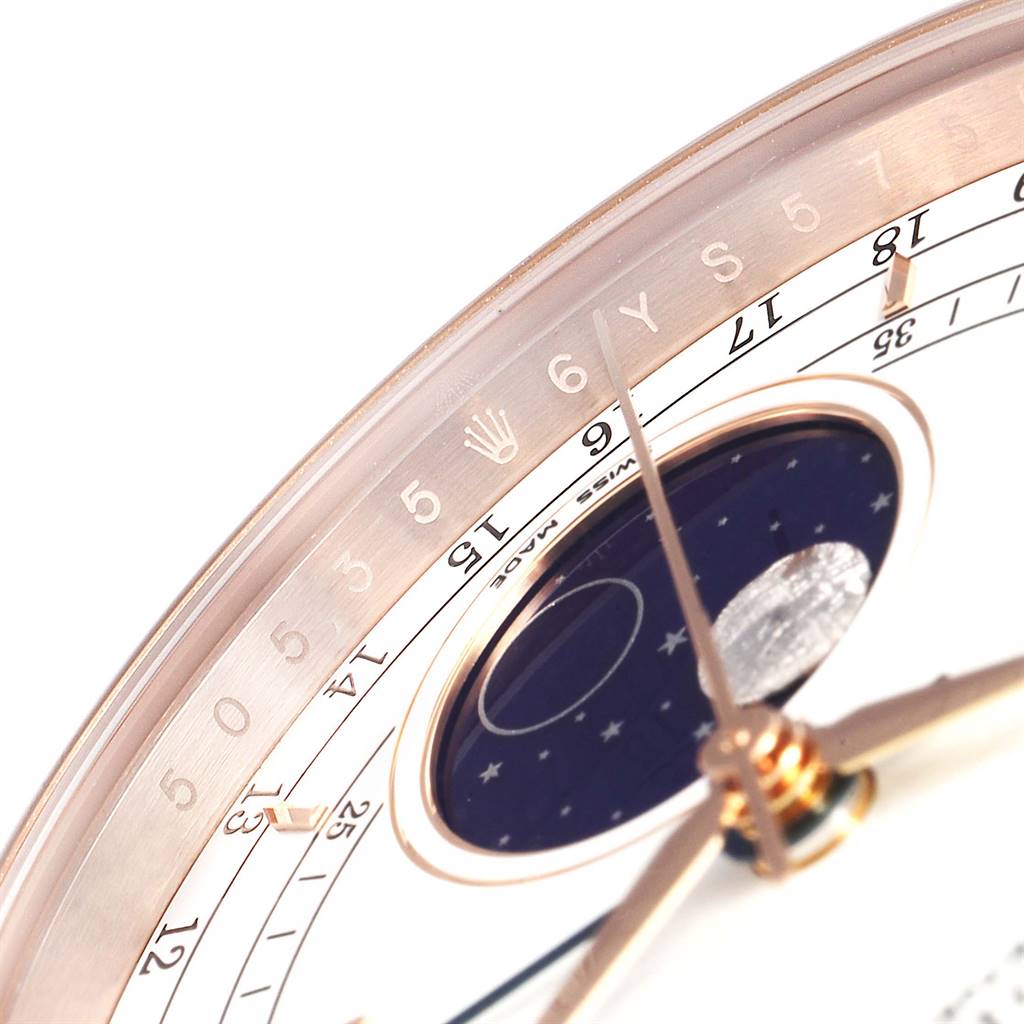 The image shows a close-up of the dial of a Rolex Cellini 50535 Men's Rose Gold White Dial 50535 Men's Rose Gold White Dial watch, highlighting the moonphase, numbers, and hour markers.