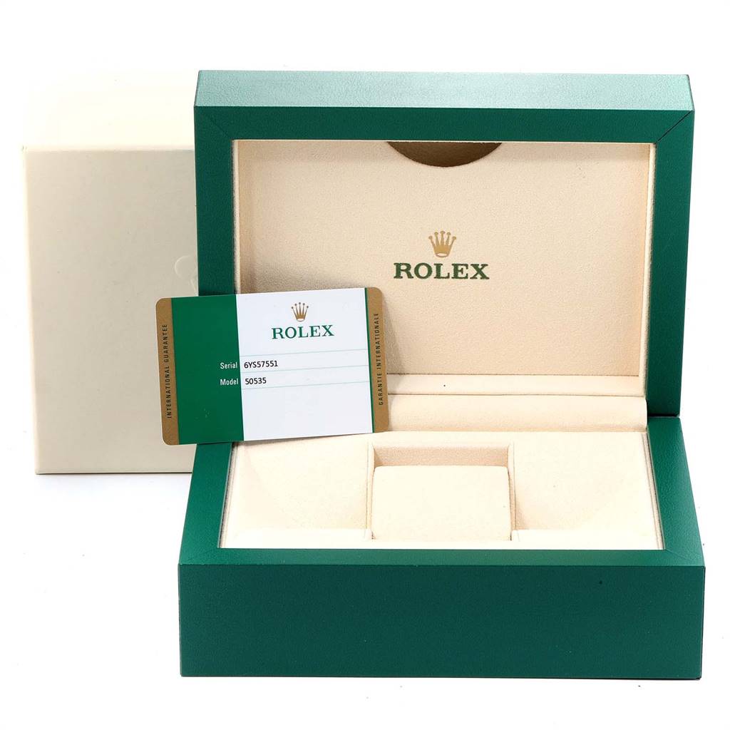 The image shows an open Rolex Cellini 50535 Men's Rose Gold White Dial 50535 Men's Rose Gold White Dial watch box and a warranty card from a front angle.