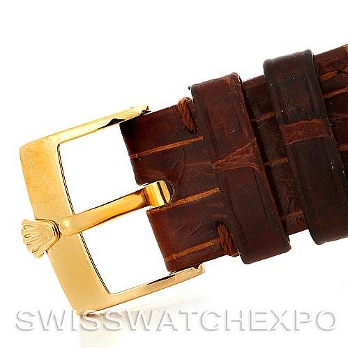 The image shows a close-up view of the gold buckle and brown leather strap of a Rolex Cellini 5116 Men's Yellow Gold Beige Dial 5116 Men's Yellow Gold Beige Dial watch.