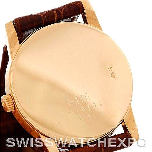 The image shows the back case and crown of a Rolex Cellini 5116 Men's Yellow Gold Beige Dial 5116 Men's Yellow Gold Beige Dial watch from an angled perspective.