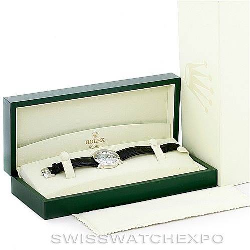 The image shows a Rolex Cellini 5241 Men's Platinum Blue Dial 5241 Men's Platinum Blue Dial watch in its open display box with a cleaning cloth beside it.