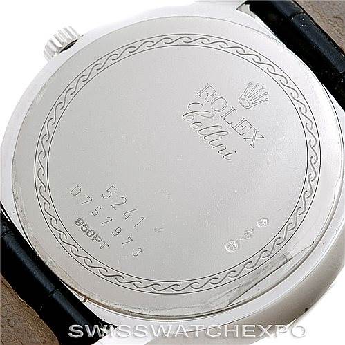 The image shows the back case of a Rolex Cellini 5241 Men's Platinum Blue Dial 5241 Men's Platinum Blue Dial model watch, featuring engravings and the brand's logo.