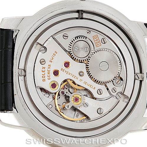 This image shows the inner mechanical movement of the Rolex Cellini 5241 Men's Platinum Blue Dial 5241 Men's Platinum Blue Dial watch from a direct back view, revealing intricate gears and components.