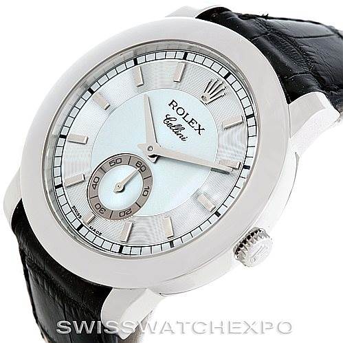 This Rolex Cellini 5241 Men's Platinum Blue Dial 5241 Men's Platinum Blue Dial watch is shown at an angle showcasing its face, bezel, crown, and leather strap.