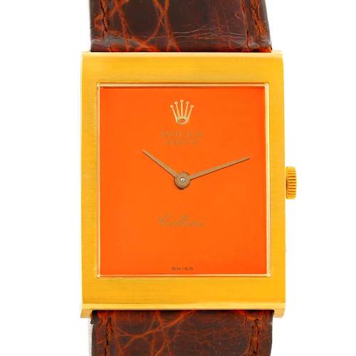 This image shows a front view of a Rolex Cellini 4014 Men's Yellow Gold Orange Dial 4014 Men's Yellow Gold Orange Dial watch, highlighting its orange dial, gold case, and brown leather strap.
