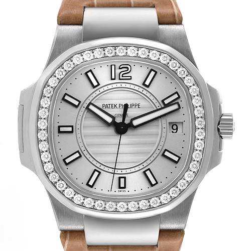 The image shows a front view of the Patek Philippe Nautilus 7010G Women's White Gold Silver Dial 7010G Women's White Gold Silver Dial watch, featuring a silver dial, diamond bezel, and a brown leather strap.