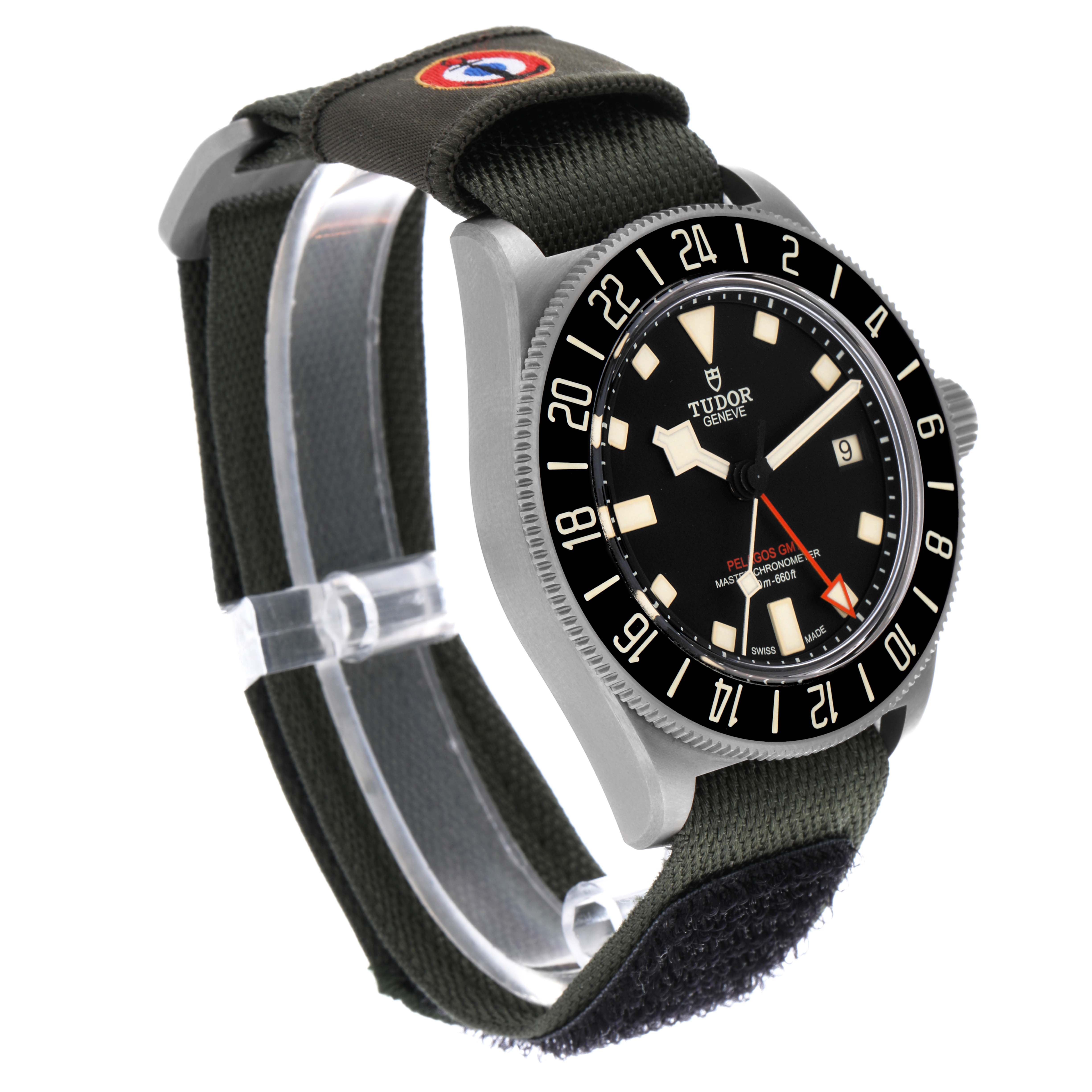 The Tudor Pelagos 2542G247NU-0001 Men's Titanium Black Dial 2542G247NU-0001 Men's Titanium Black Dial watch is shown at a three-quarter angle, highlighting the dial, bezel, and fabric strap.