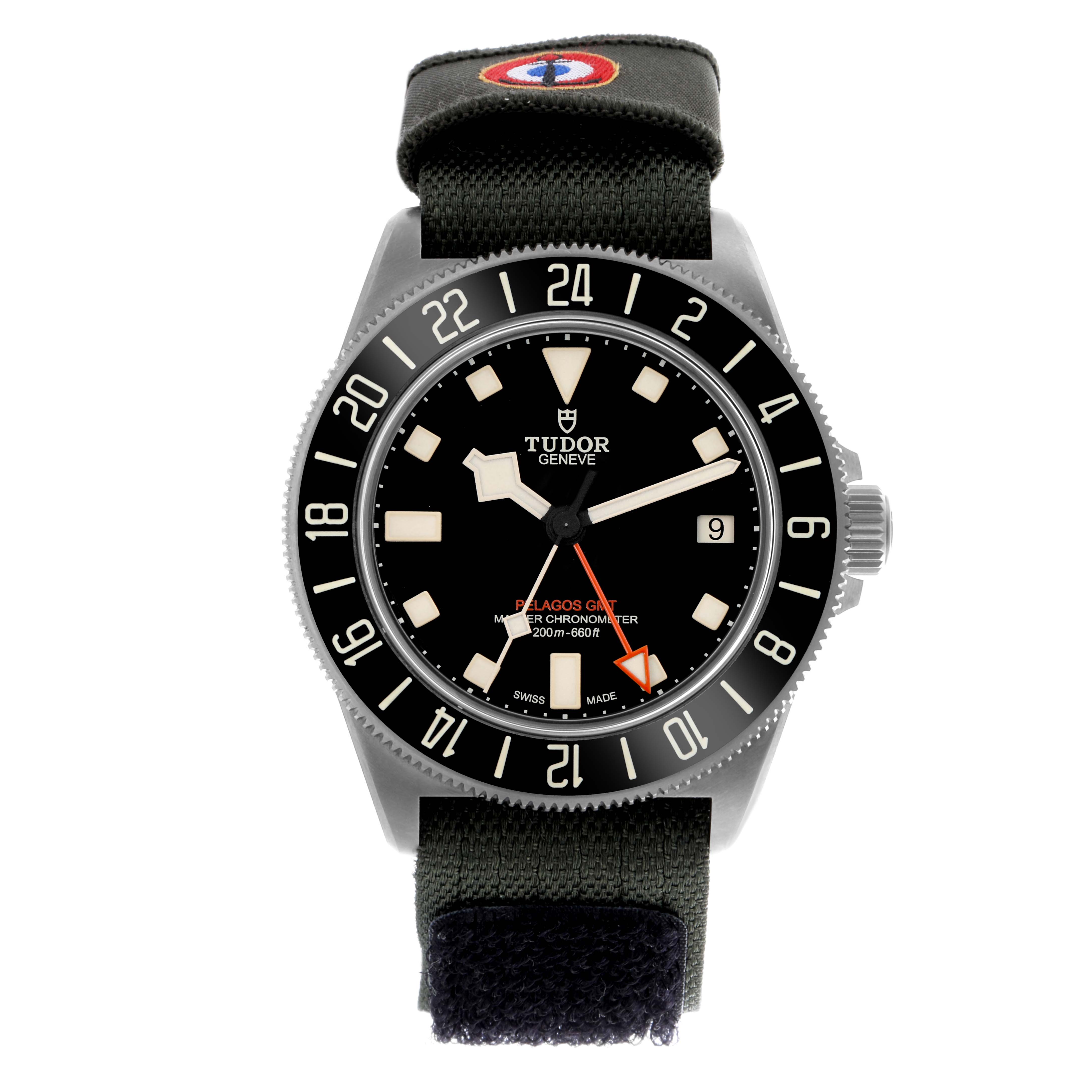 The Tudor Pelagos 2542G247NU-0001 Men's Titanium Black Dial 2542G247NU-0001 Men's Titanium Black Dial watch is shown from a front angle, highlighting the dial, bezel, and fabric strap.