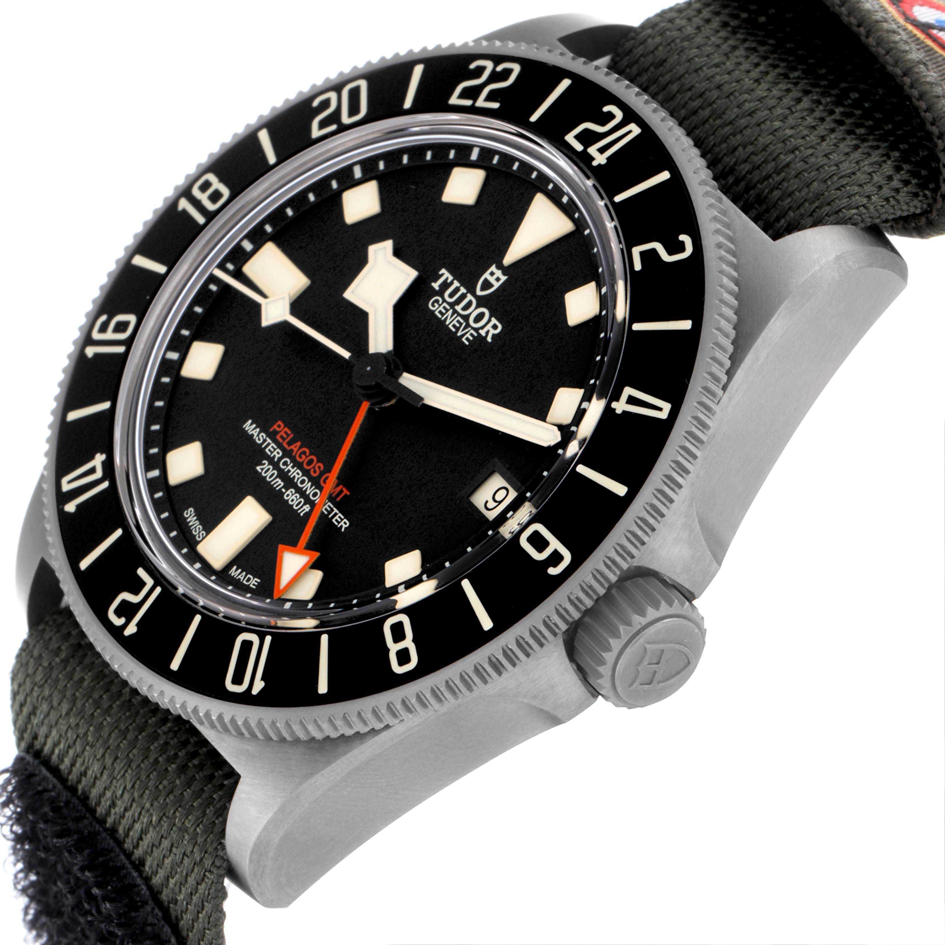 The Tudor Pelagos 2542G247NU-0001 Men's Titanium Black Dial 2542G247NU-0001 Men's Titanium Black Dial watch is shown from a side angle, highlighting the face, bezel, crown, and fabric strap.