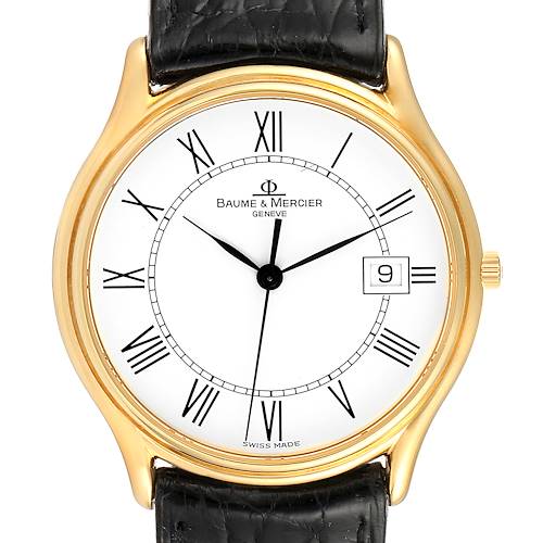 This image shows a front view of the Baume & Mercier Classima MV045236 Men's Yellow Gold White Dial MV045236 Men's Yellow Gold White Dial watch, displaying the dial with Roman numerals, date window, and black leather strap.