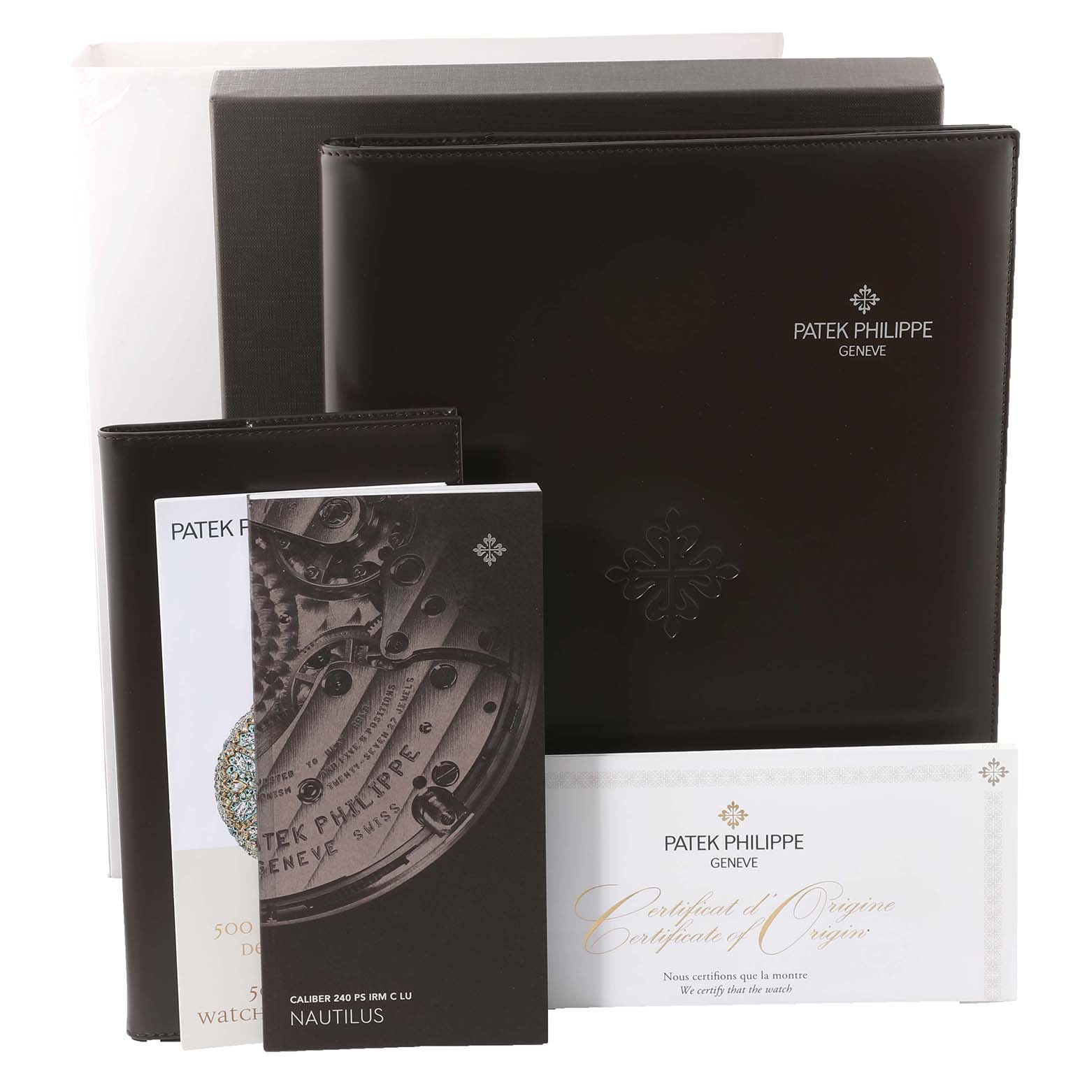 The image shows Patek Philippe Calatrava 5057G-010 Men's White Gold Grey Dial 5057G-010 Men's White Gold Grey Dial watch packaging and accessories, including booklets and a certificate of origin.