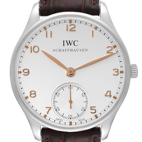 This image shows the face of an IWC Portuguese IW545408 Men's Stainless Steel Silver Dial IW545408 Men's Stainless Steel Silver Dial model watch, featuring a white dial, gold numerals, a second sub-dial, and a leather strap.