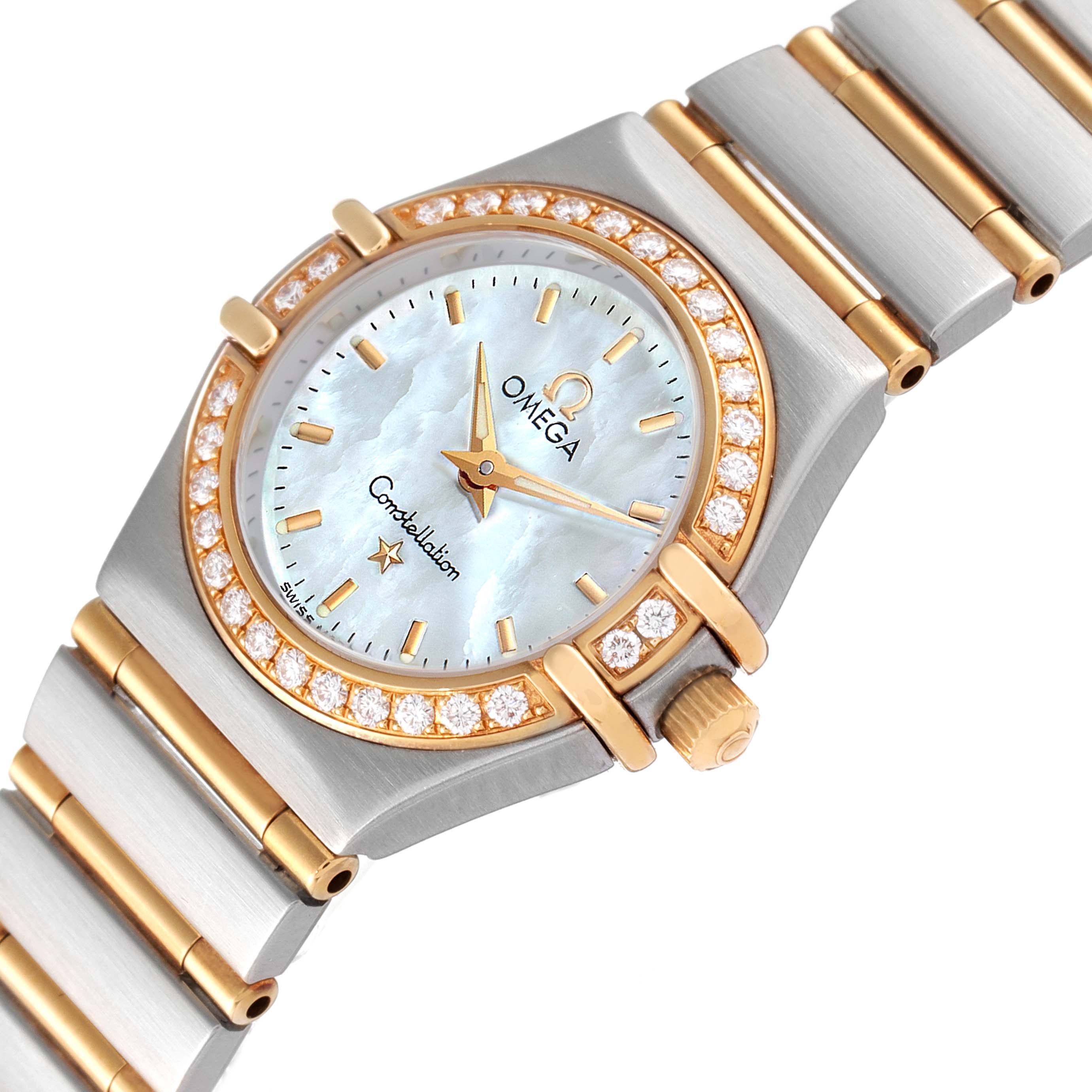 The image shows an Omega 1267.70.00 Women's Steel and Gold (two tone) Mother of Pearl Dial 1267.70.00 Women's Steel and Gold (two tone) Mother of Pearl Dial Constellation Steel Yellow Gold MOP Diamond Watch model 1267.70.00 from an angled top view, focusing on the face, bezel, and partial bracelet.