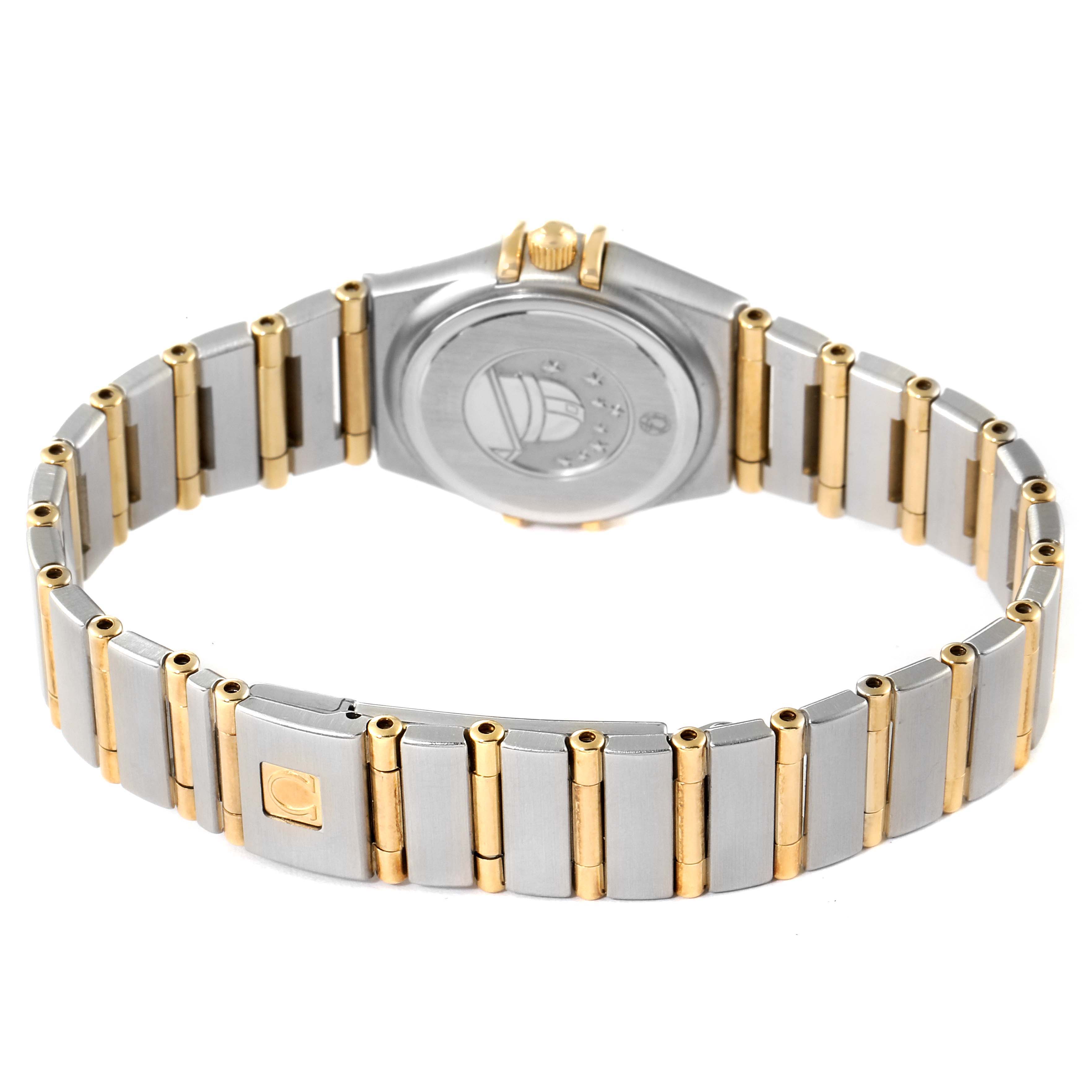 The image shows the back side and bracelet of the Omega 1267.75.00 Women's Steel and Gold (two tone) Mother of Pearl Dial 1267.75.00 Women's Steel and Gold (two tone) Mother of Pearl Dial Constellation 95 Mother of Pearl Diamond Ladies Watch 1267.75.00.