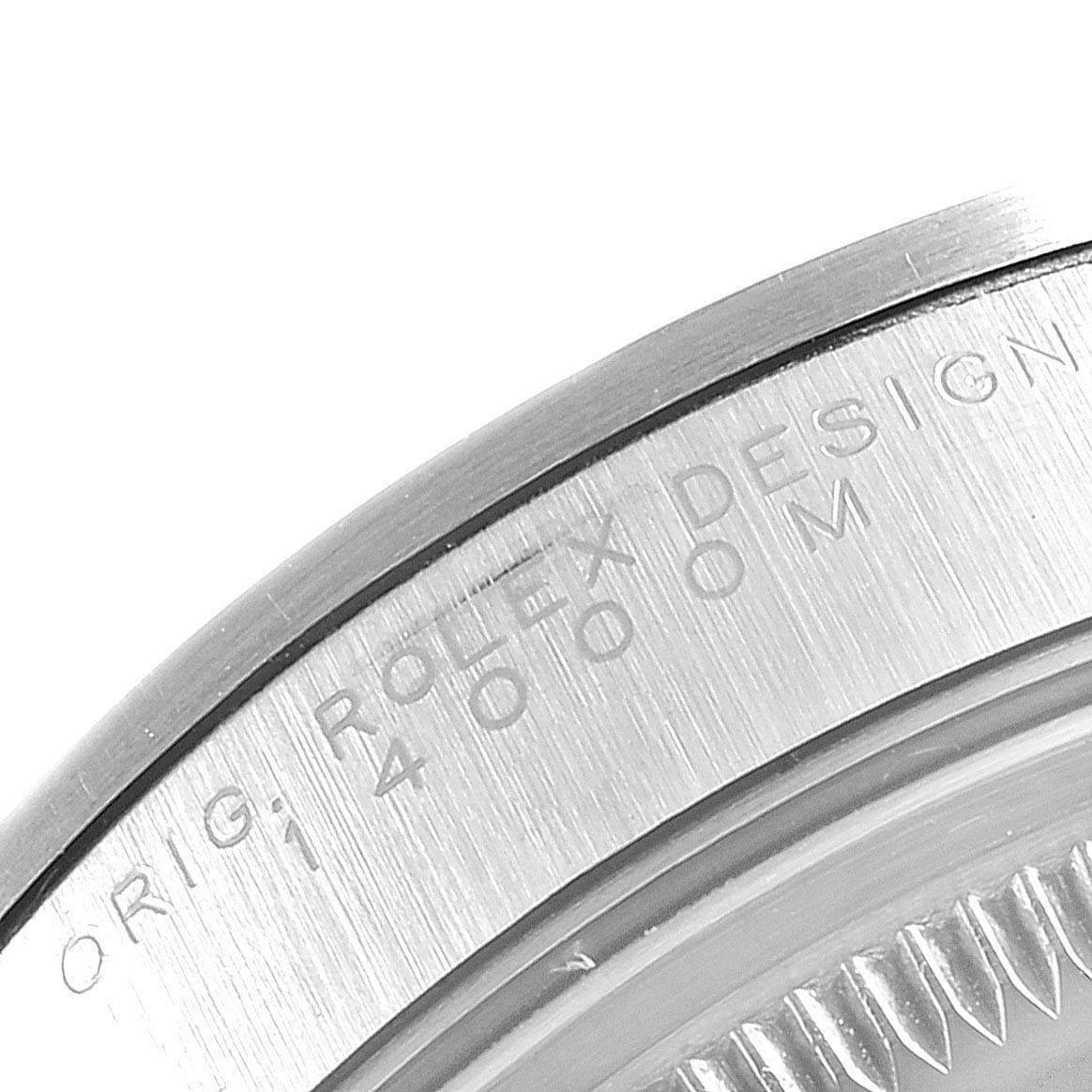 This image shows a close-up of the side engraving on the case back of a Rolex Air-King 14000 Men's Stainless Steel Black Dial 14000 Men's Stainless Steel Black Dial watch.