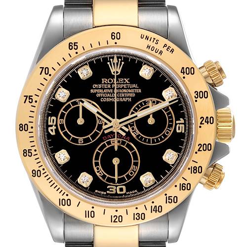 This image shows the dial and bezel of the Rolex Daytona 116523 Men's Steel and Gold (two tone) Black Dial 116523 Men's Steel and Gold (two tone) Black Dial, highlighting its chronograph subdials and tachymeter scale.