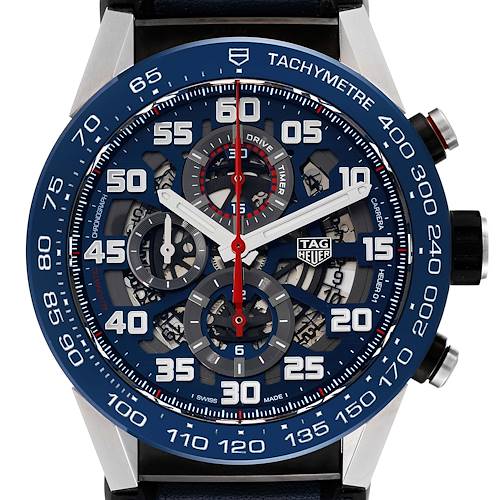 The image shows a frontal view of the Tag Heuer Carrera CAR2A1N.FT6100 Men's Stainless Steel Blue Dial CAR2A1N.FT6100 Men's Stainless Steel Blue Dial watch, highlighting its dial, tachymeter, and chronograph features.