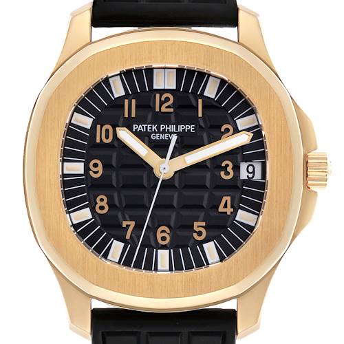 The image shows a straight-on view of the Patek Philippe Aquanaut 5065J Men's Yellow Gold Black Dial 5065J Men's Yellow Gold Black Dial watch, highlighting its dial, bezel, and rubber strap.