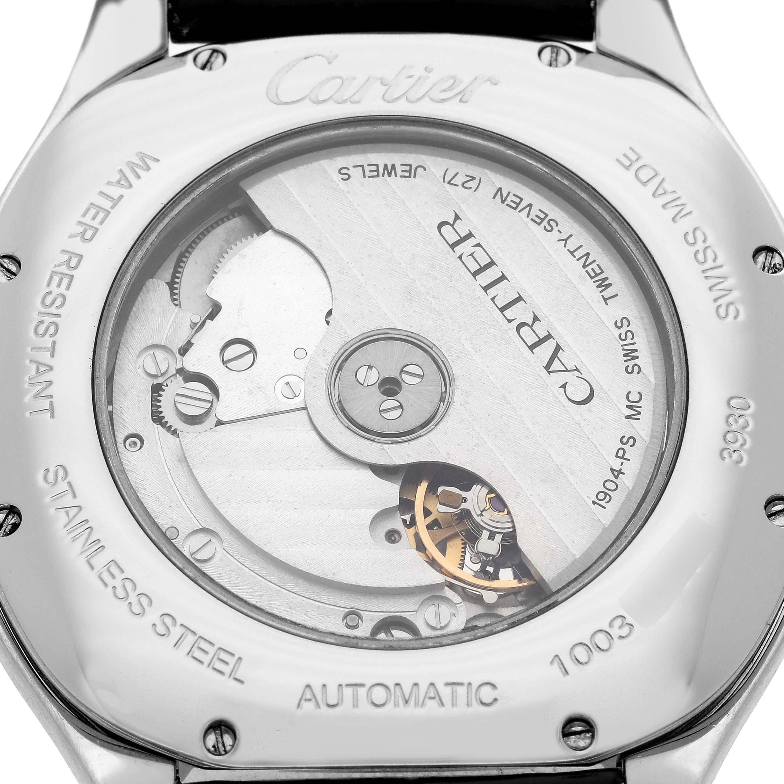 The image shows the back view of a Drive de Cartier watch by Cartier, highlighting its inner mechanical components.