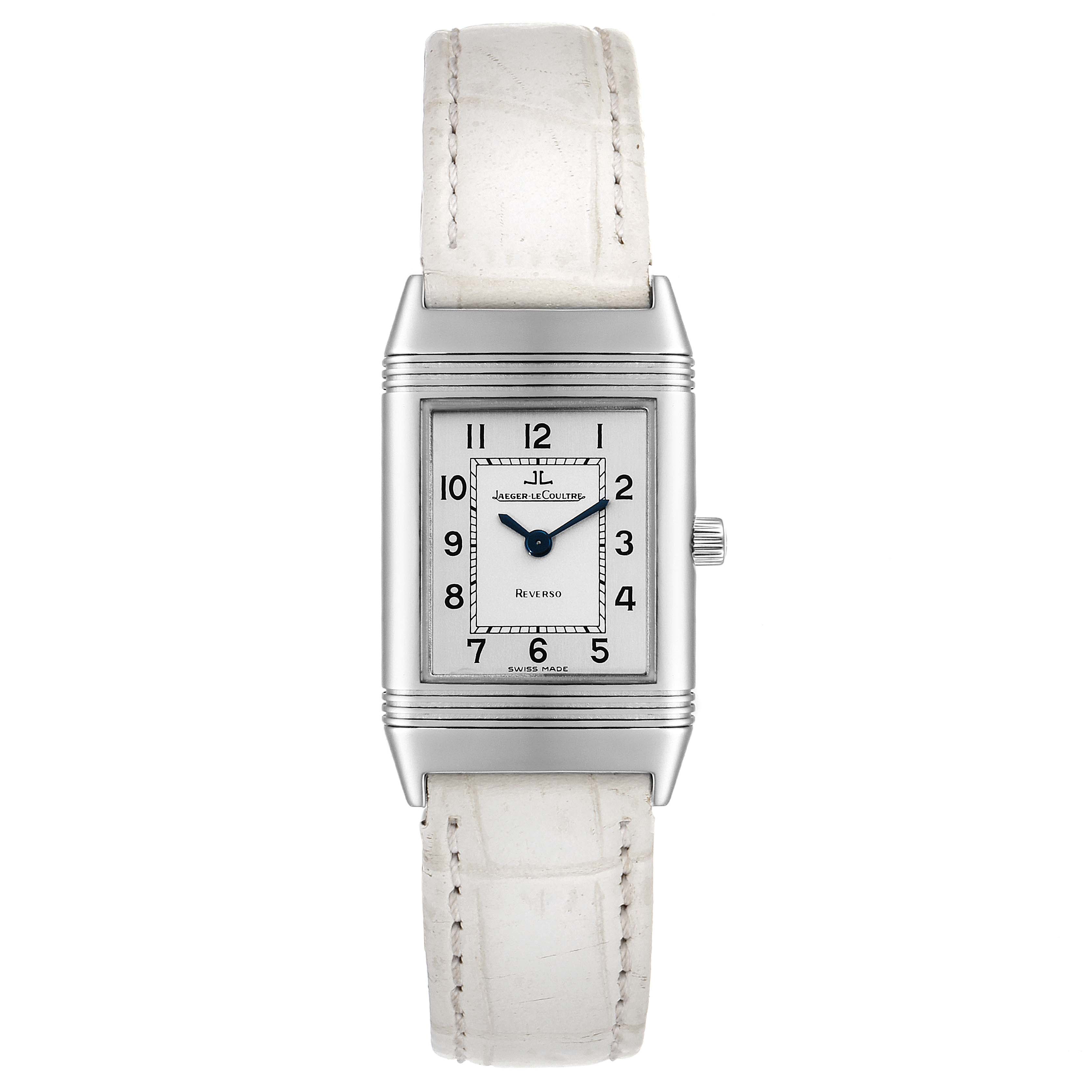 The image shows a front view of a Jaeger LeCoultre Reverso 260.8.08 Women's Stainless Steel Silver Dial 260.8.08 Women's Stainless Steel Silver Dial watch with a white strap and silver rectangular case.