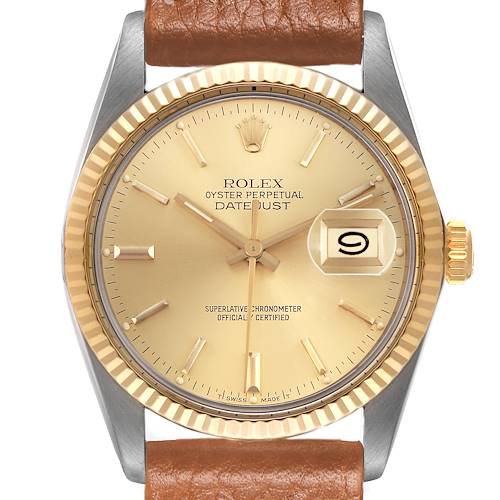 The Rolex Datejust 16013 Men's Steel and Gold (two tone) Champagne Dial 16013 Men's Steel and Gold (two tone) Champagne Dial watch is shown from a front angle, displaying its dial, bezel, and brown leather strap.