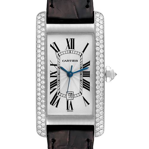 The image shows a front view of the Cartier Tank Américaine watch, highlighting the face, Roman numerals, and diamond-encrusted bezel.
