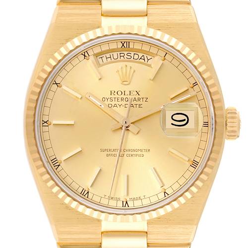 The image shows a front view of the Rolex Oysterquartz 19018 Men's Yellow Gold Champagne Dial 19018 Men's Yellow Gold Champagne Dial Day-Date watch, highlighting its gold case, dial, and bracelet.