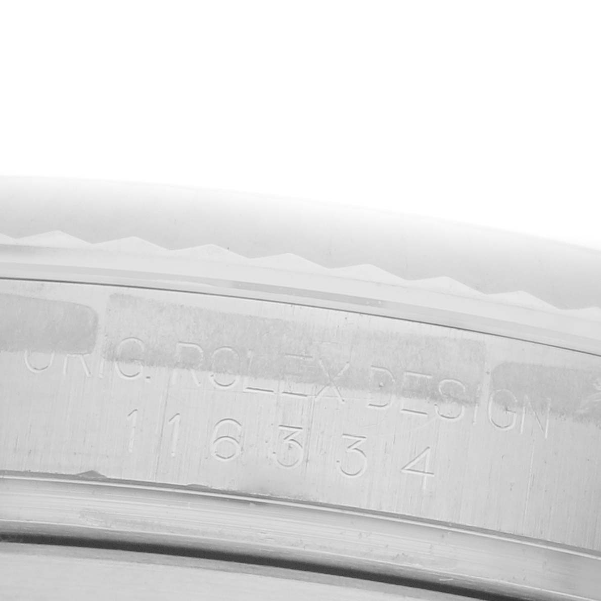The image shows a close-up of the side engraving on the Rolex Datejust 41 116334 Men's Stainless Steel Silver Dial 116334 Men's Stainless Steel Silver Dial, highlighting the model number and design text.