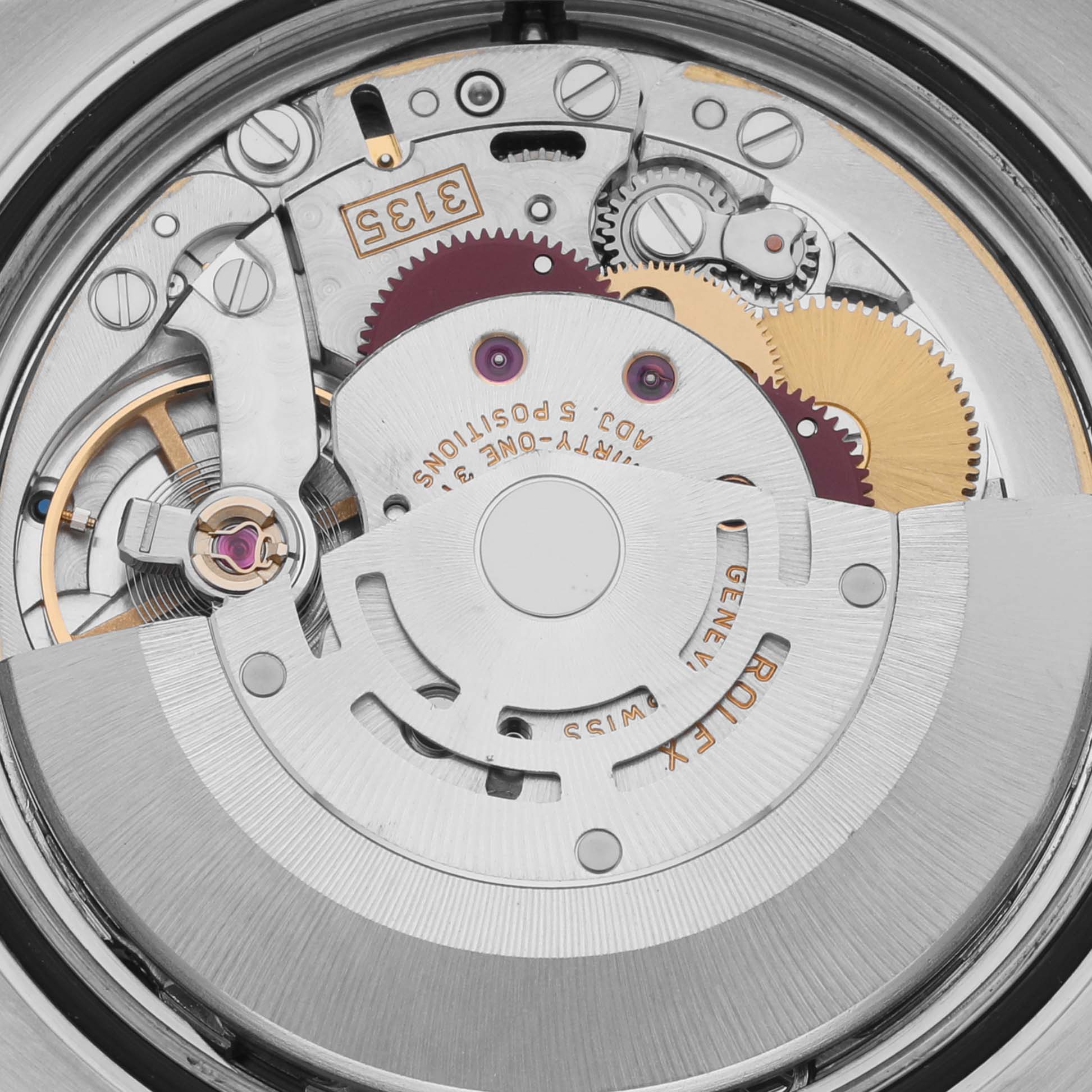 The image shows the movement of a Rolex Turn-o-Graph 116264 Men's Stainless Steel Blue Dial 116264 Men's Stainless Steel Blue Dial watch from a top-down angle, revealing gears and components.