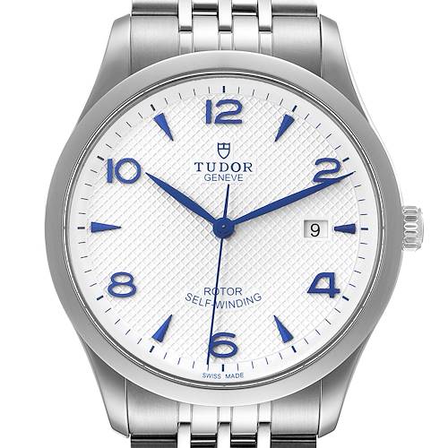 The Tudor 1926 M91650-0005 Men's Stainless Steel Silver Dial M91650-0005 Men's Stainless Steel Silver Dial model watch is shown from a top view, displaying the dial, hands, bezel, and part of the bracelet.