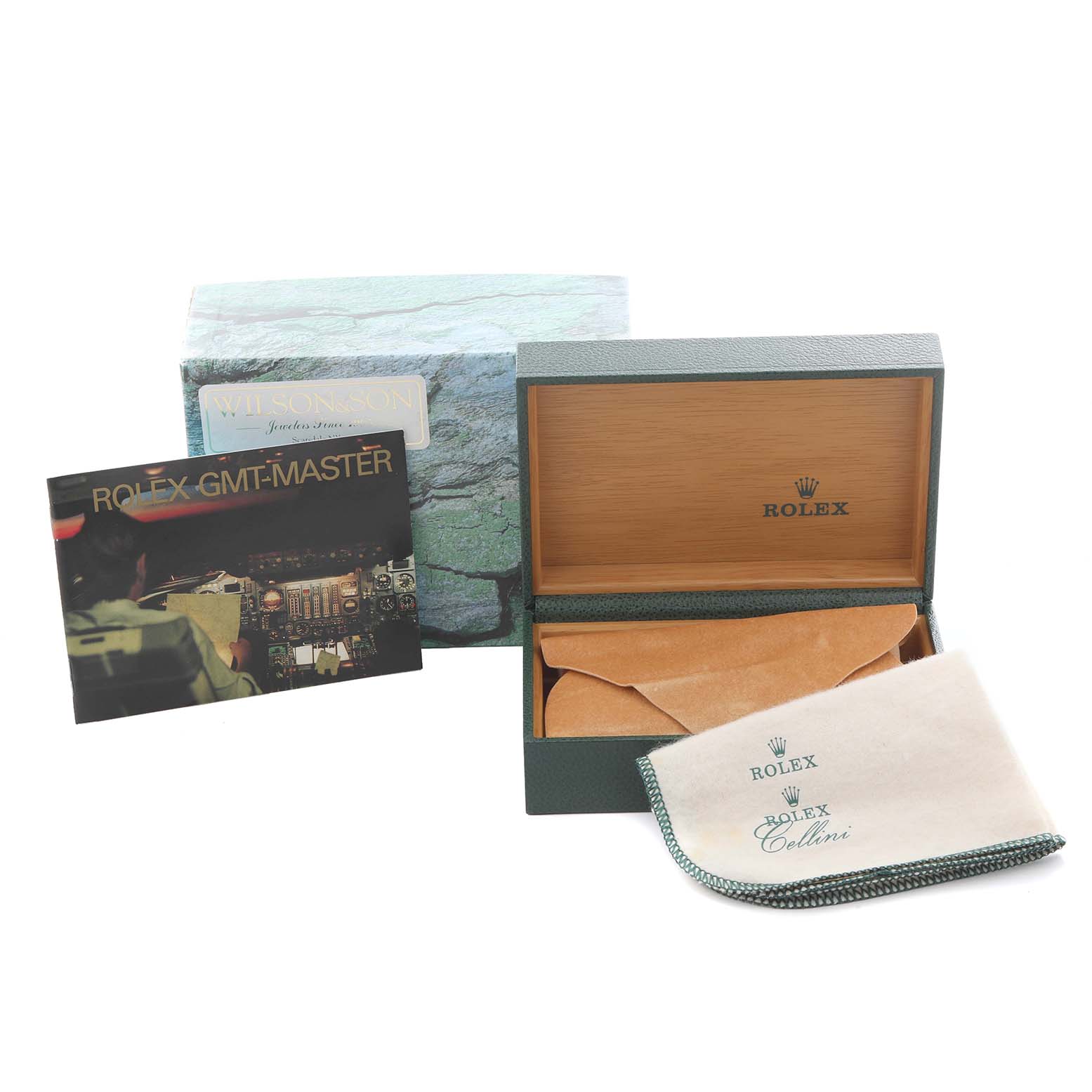 The image shows the packaging and accessories for a Rolex Yacht-Master 169622 Women's Stainless Steel Silver Dial 169622 Women's Stainless Steel Silver Dial, including a box, outer sleeve, manual, and cleaning cloth.