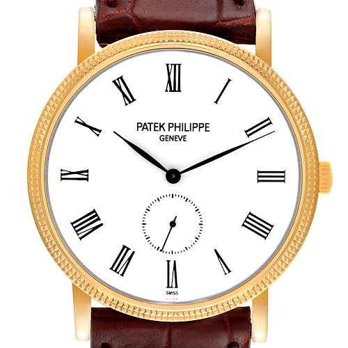 The image shows a front view of a Patek Philippe Calatrava 5119J Men's Yellow Gold White Dial 5119J Men's Yellow Gold White Dial model watch, highlighting its face, bezel, and part of its leather strap.