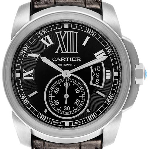 The image shows a front view of the Calibre de Cartier watch, highlighting the dial, Roman numerals, hands, and crown.